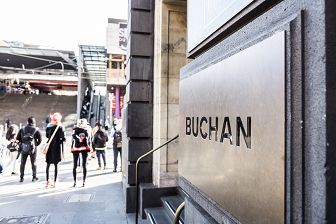 Buchan entrance signage at the Mail Exchange building front door