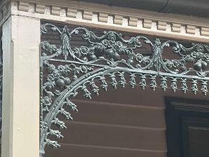 Close up of the cast-iron lace at the entrance of the building.