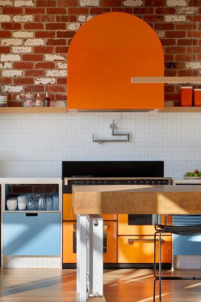 Kitchen detail with the stove and orange 